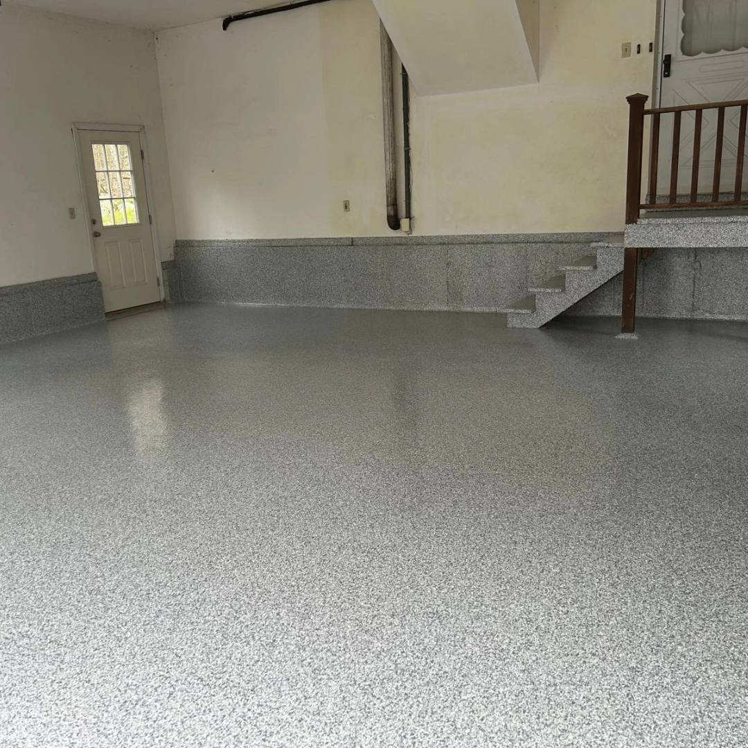 Residential garage epoxy flooring with stairs