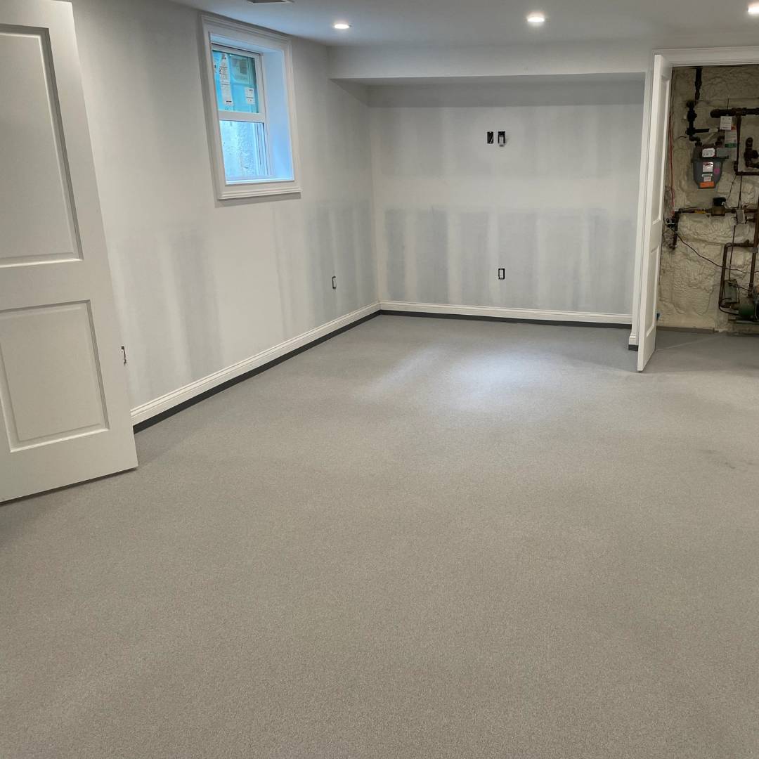 finished epoxy flooring in a residential homes basement